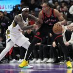 Indiana Pacers forward Pascal Siakam (43) defends against Toronto Raptors forward Scottie Barnes (4)