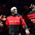Toronto Raptors guard Immanuel Quickley (5) is greeted by teammates during player introductions before tip off against the Brooklyn Nets at Scotiabank Arena.