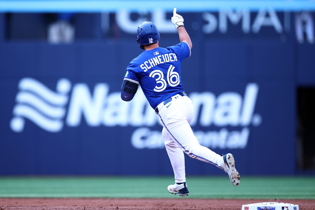 Davis Schneider #36 of the Toronto Blue Jays runs the bases after hitting a home run in the first inning during a game against the New York Yankees at Rogers Centre on July 02, 2025 in Toronto, Ontario, Canada.