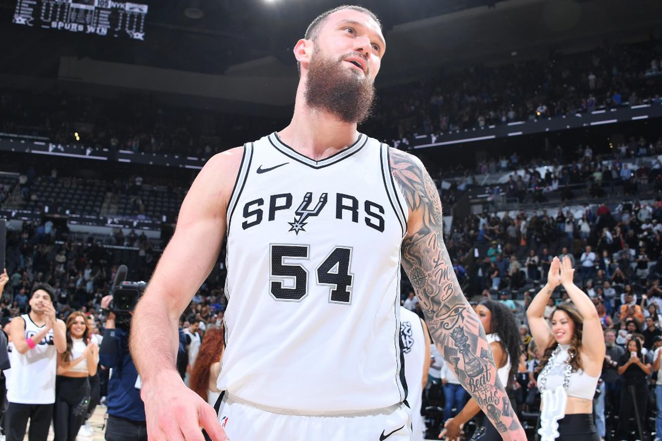 Sandro Mamukelashvili celebrates a San Antonio Spurs win.